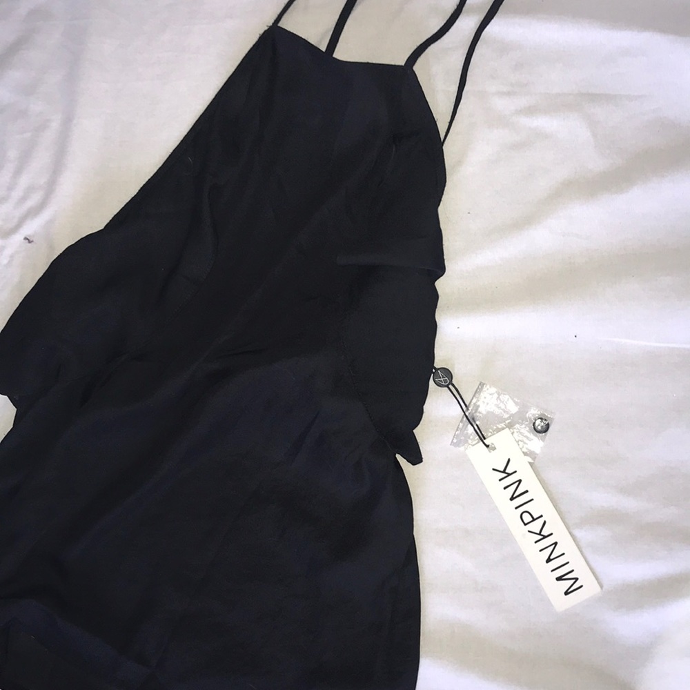 Black silky top with flowy detail